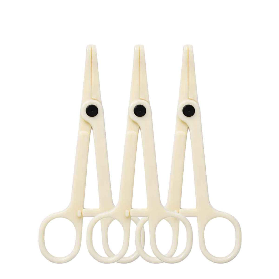 Three pairs of piercing navel clamps with black handles on a white background